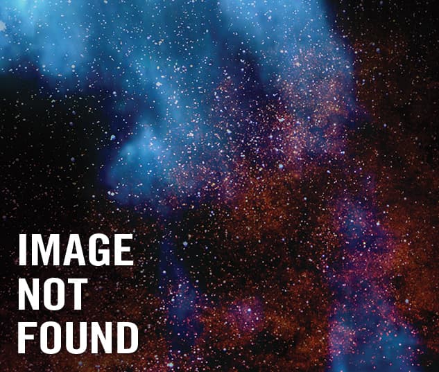 person standing on pile of comics books