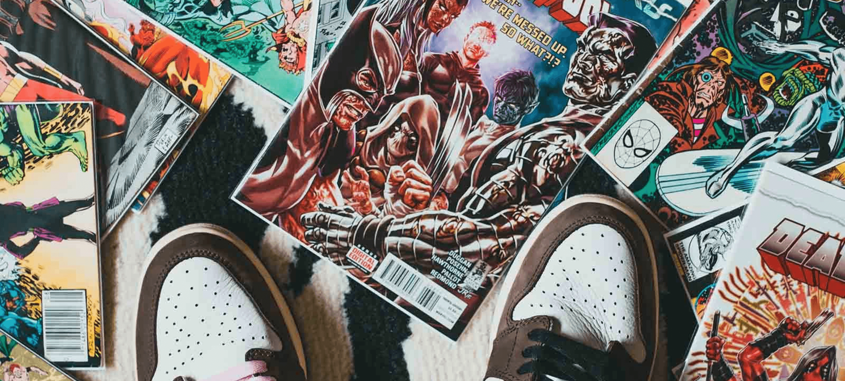 person standing on pile of comics books